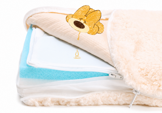 Cloud dog bed with its cover unzipped to show the layered interior